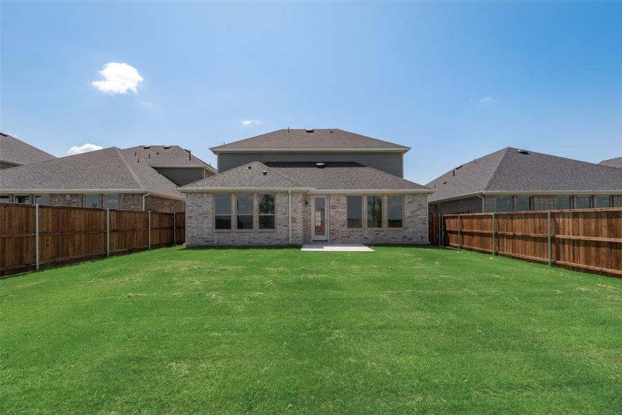 Front exterior of a new home in Arbors at Legacy Hills, Celina, TX, highlighting curb appeal (Image 19). Front exterior of a new home in Arbors at Legacy Hills, Celina, TX, highlighting curb appeal (Image 19).