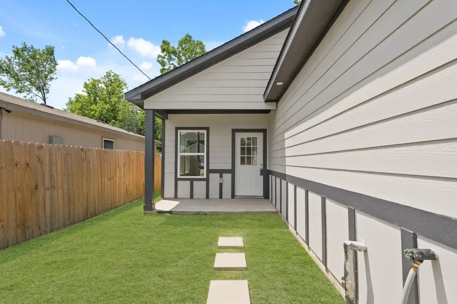 Exterior details and patio area of a home in , Houston (Image 3).