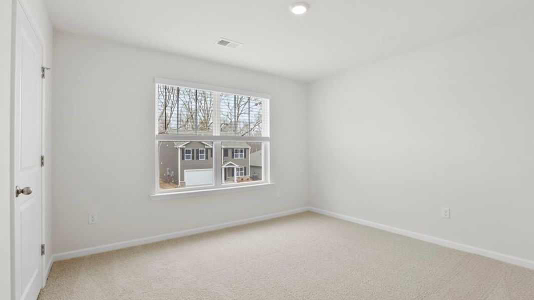 Spacious, unfurnished interior of a new home in Lakestone, Woodruff (Image 24).