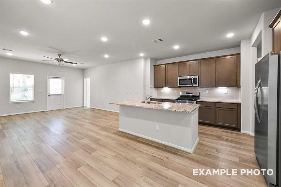 Furnished interior view inside a new home in Lakes at Black Oak, Magnolia (Image 5).