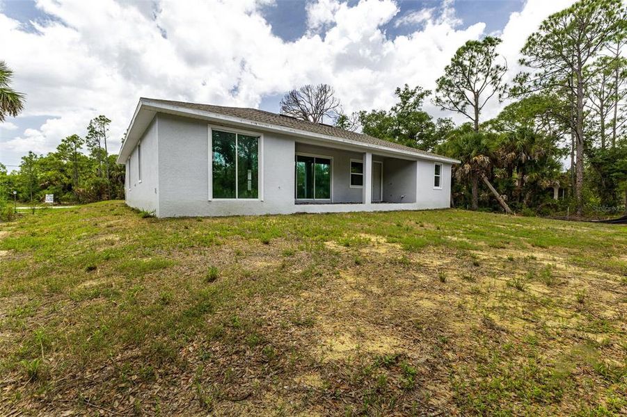 Exterior details and patio area of a home in , Port Charlotte (Image 15).