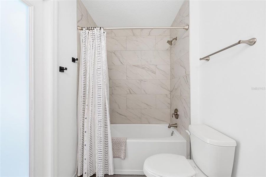 Furnished interior view inside a new home in , Dunnellon (Image 7).