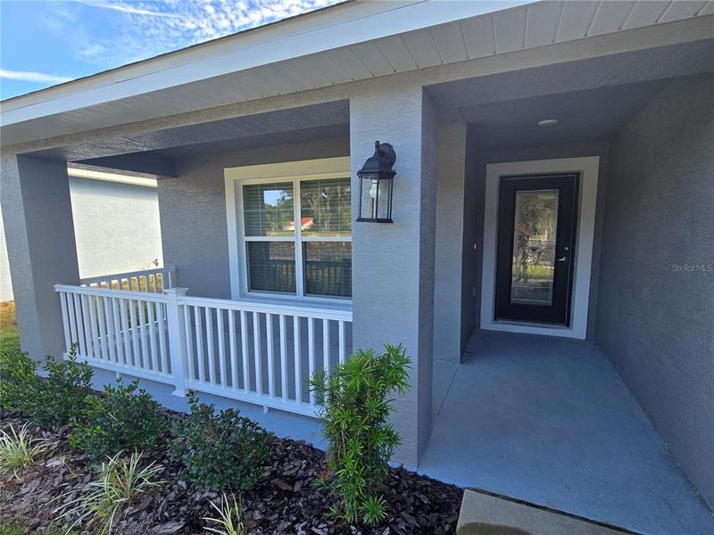 Exterior details and patio area of a home in Wyld Palms, Inverness (Image 15).