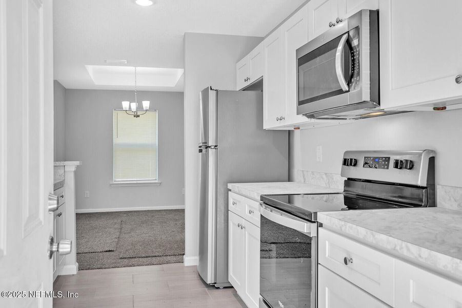 Furnished interior view inside a new home in , Jacksonville (Image 6).