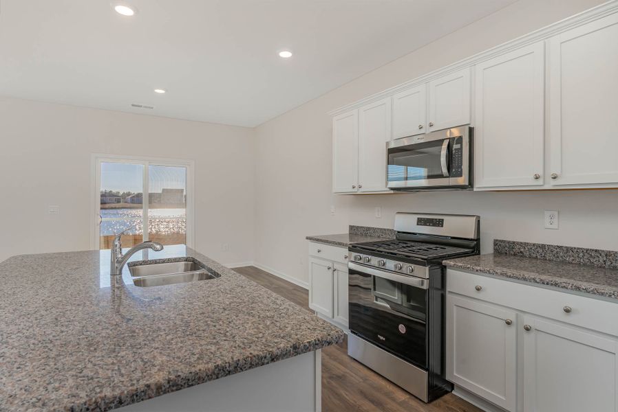 Representative furnished interior of a home built from the HAYDEN by D.R. Horton in Island Green, Myrtle Beach (Image 12).