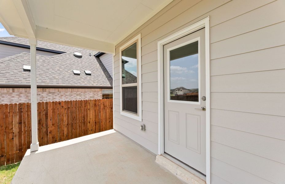 Exterior details and patio area of a home in Saddleback at Santa Rita Ranch, Liberty Hill (Image 23).