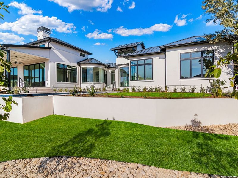 Exterior details and patio area of a home in , San Antonio (Image 36).