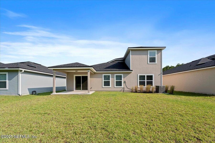 Exterior details and patio area of a home in Dunns Crossing, Jacksonville (Image 28). Exterior details and patio area of a home in Dunns Crossing, Jacksonville (Image 28).