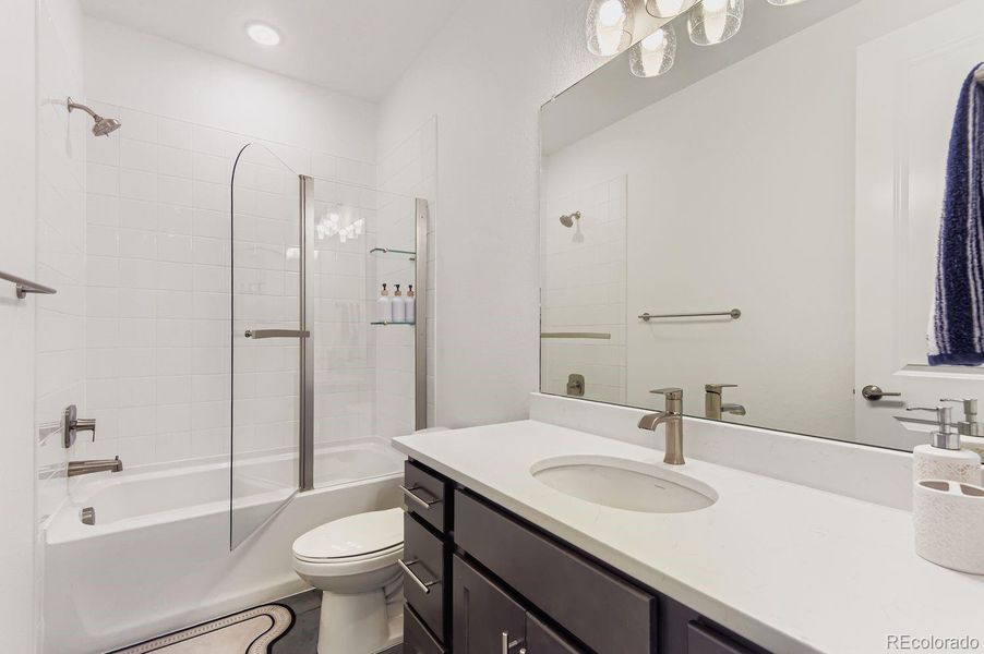 Full guest bathroom for second-level bedrooms.