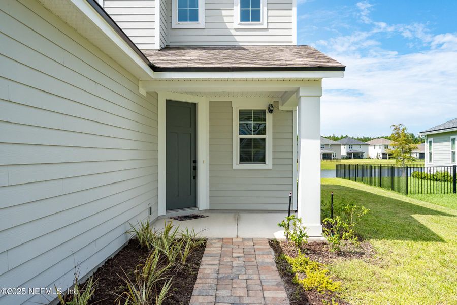 Front exterior of a new home in , St. Augustine, FL, highlighting curb appeal (Image 19).