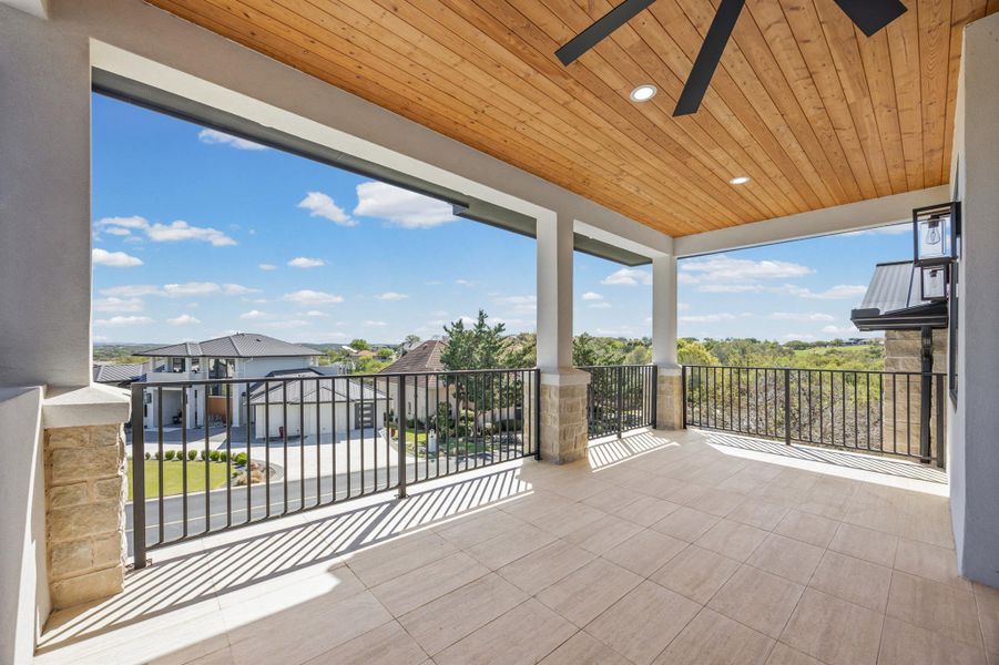 Balcony featuring ceiling fan