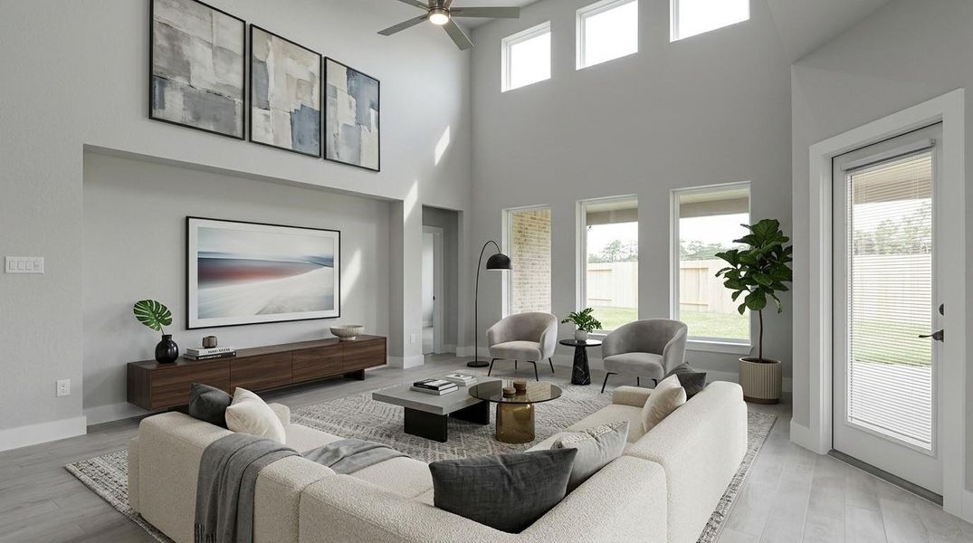 Welcome family and guests to your charming living room! With its high ceilings, recessed lighting, ceiling fan, custom paint, beautiful flooring, and large windows that let in abundant natural light, this room is perfect for gatherings. Sample photo of completed home with similar floor plan. Actual colors and selections may vary. Welcome family and guests to your charming living room! With its high ceilings, recessed lighting, ceiling fan, custom paint, beautiful flooring, and large windows that let in abundant natural light, this room is perfect for gatherings. Sample photo of completed home with similar floor plan. Actual colors and selections may vary.