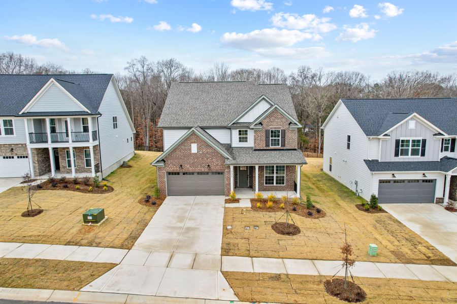 Front exterior of a new home in Forest Creek, Waxhaw, NC, highlighting curb appeal (Image 32).
