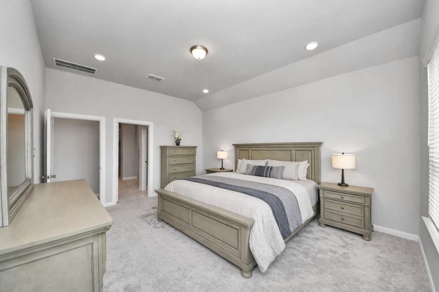 Corner view of primary bedroom.