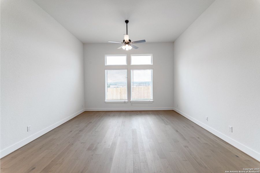 Spacious, unfurnished interior of a new home in The Woodlands at Medina Hills, Mico (Image 14).