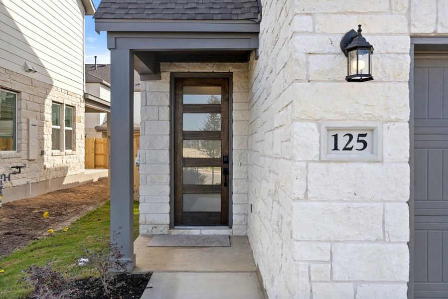 Exterior details and patio area of a home in Union Collection at Park Central, Georgetown (Image 3).