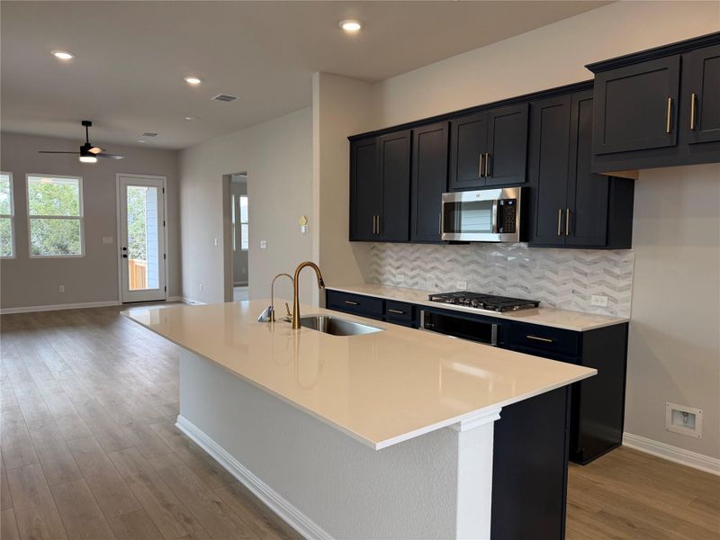 Furnished interior view inside a new home in Cannon Ranch 40s, Dripping Springs (Image 5).