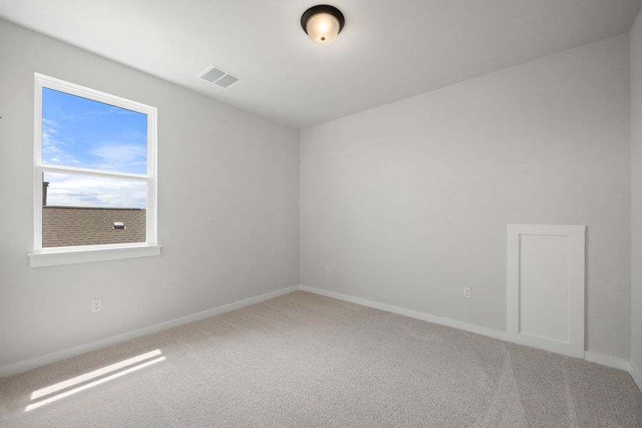 Spacious, unfurnished interior of a new home in Terrace Collection At Turner's Crossing, Buda (Image 40).
