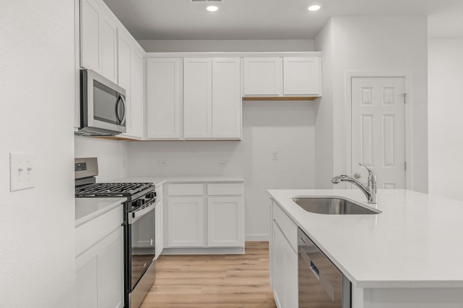 Furnished interior view inside a new home in Painted Prairie, Aurora (Image 7). Furnished interior view inside a new home in Painted Prairie, Aurora (Image 7).