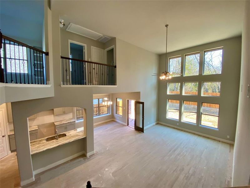 View from above of family room. Wood floors not stained yet