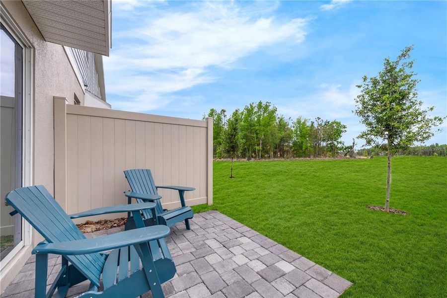 Exterior details and patio area of a home in Avalon Park Tavares Single Family Homes, Tavares (Image 21).