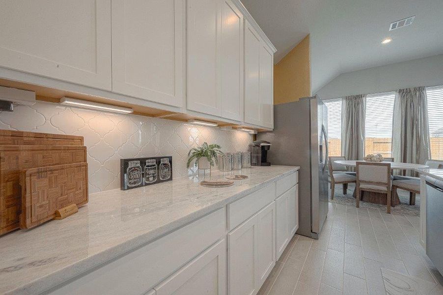 Furnished interior view inside a new home in Grand Magnolia, Magnolia (Image 14).
