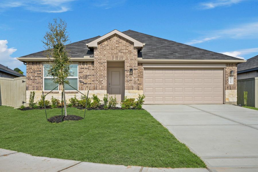 Front exterior of a new home in Harrington Trails at The Canopies, Splendora, TX, highlighting curb appeal (Image 15).