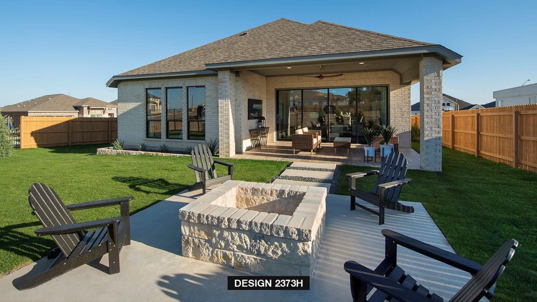 Back of property with brick siding, ceiling fan, a fenced backyard, a patio area, and an outdoor living space with a fire pit Back of property with brick siding, ceiling fan, a fenced backyard, a patio area, and an outdoor living space with a fire pit