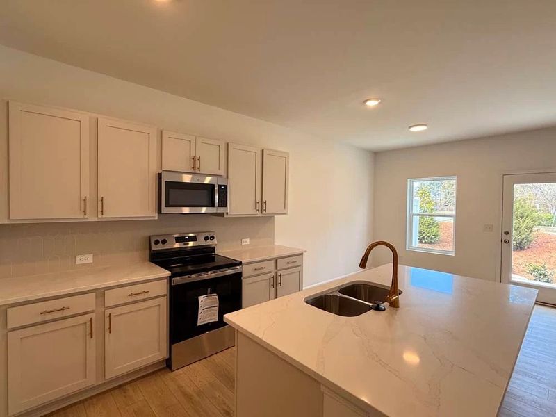 Kitchen featuring Serene Collection Finishes
