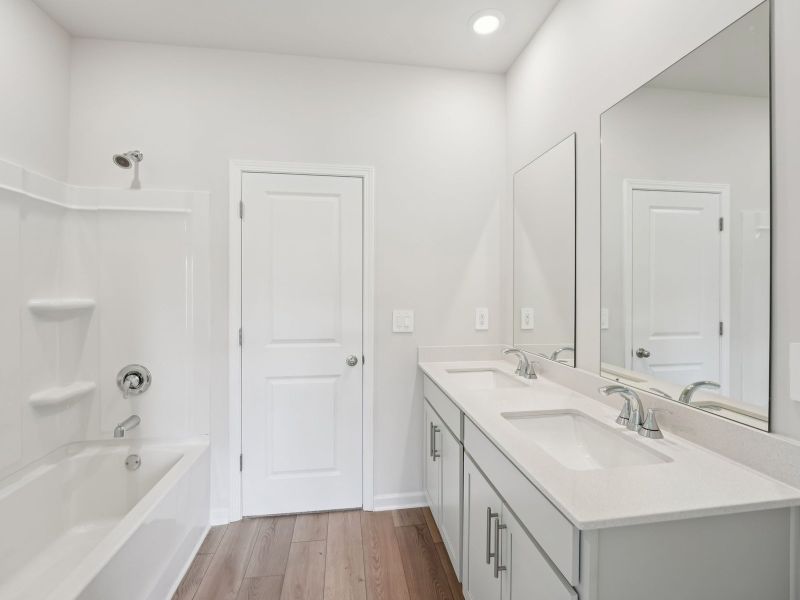 Furnished interior view inside a new home in Northwoods at Mirror Lake, Villa Rica (Image 11).