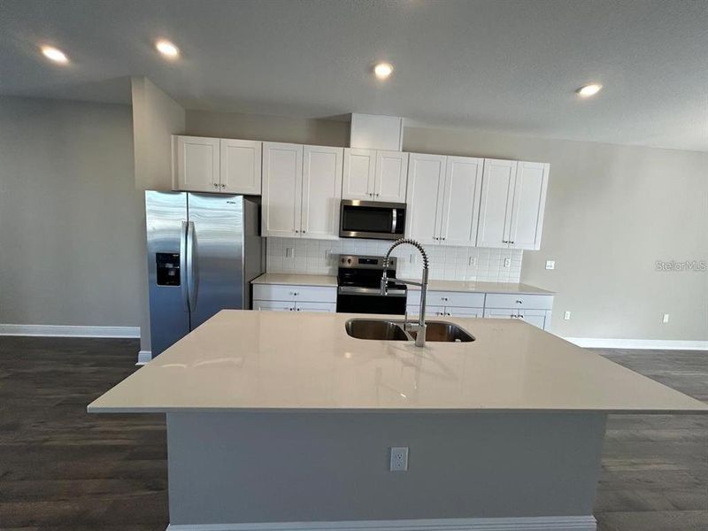 Furnished interior view inside a new home in , Winter Garden (Image 6).