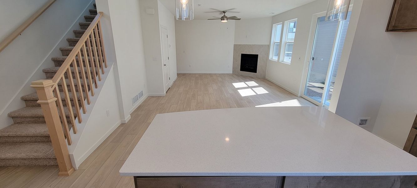 Spacious, unfurnished interior of a new home in Revel Crossing at Wolf Ranch – The Ascent Collection, Colorado Springs (Image 12). Spacious, unfurnished interior of a new home in Revel Crossing at Wolf Ranch – The Ascent Collection, Colorado Springs (Image 12).