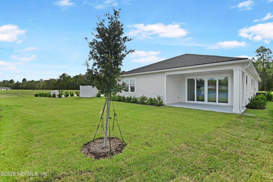 Exterior details and patio area of a home in Woodbridge, Fernandina Beach (Image 2). Exterior details and patio area of a home in Woodbridge, Fernandina Beach (Image 2).