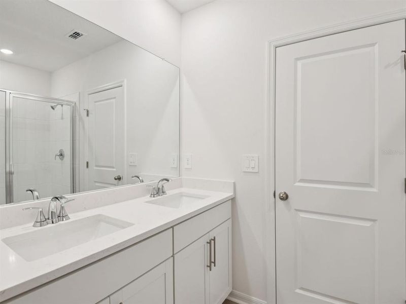 Furnished interior view inside a new home in The Grove at Stuart Crossing - Classic Series, Bartow (Image 7). Furnished interior view inside a new home in The Grove at Stuart Crossing - Classic Series, Bartow (Image 7).