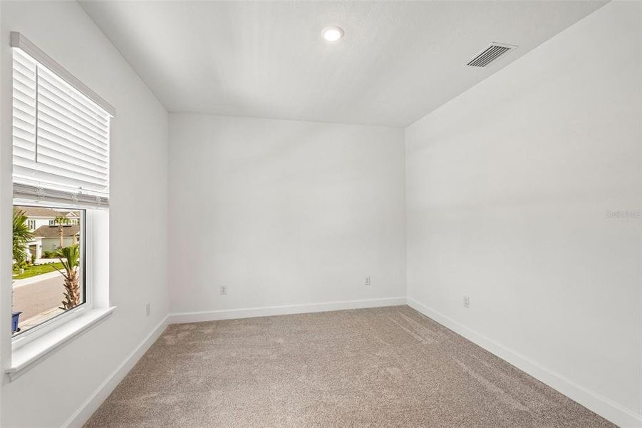 Spacious, unfurnished interior of a new home in Tiburon, Nokomis (Image 44).