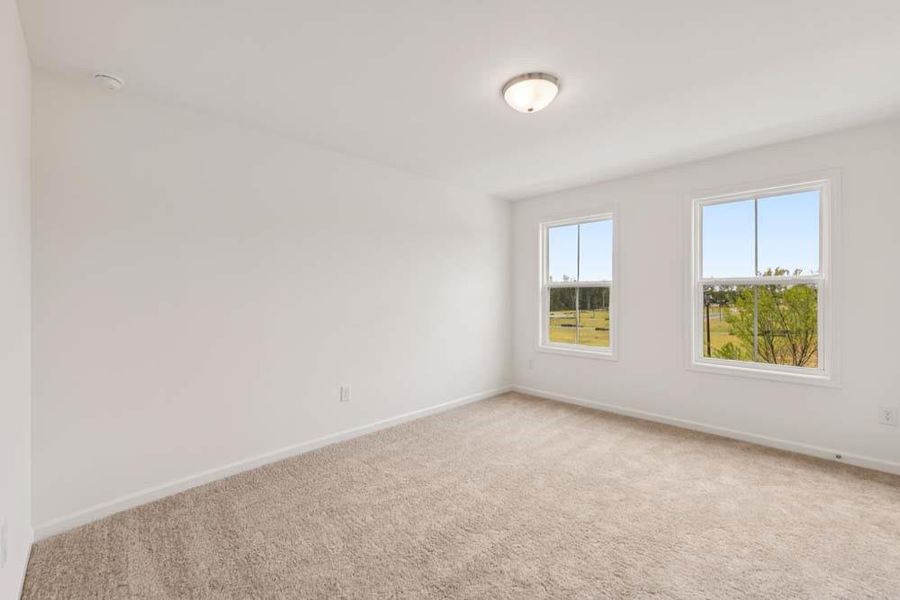 Spacious, unfurnished interior of a new home in Eastlyn Crossing, Flowery Branch (Image 23). Spacious, unfurnished interior of a new home in Eastlyn Crossing, Flowery Branch (Image 23).