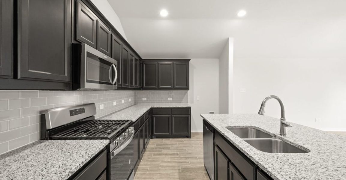 Representative exterior photo of a completed home built from the Boston by Impression Homes in Baker Farms, Cleburne, TX (Image 5).