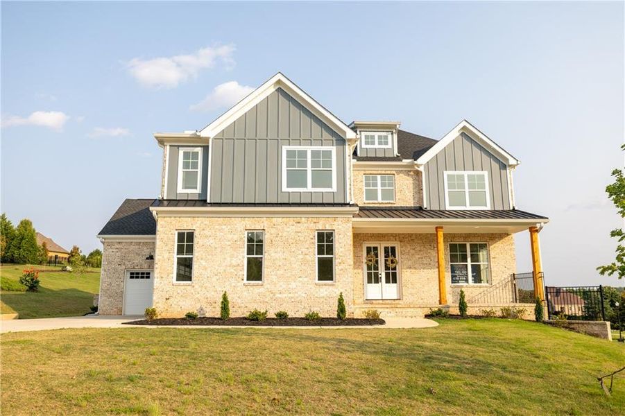 Front exterior of a new home in , Jefferson, GA, highlighting curb appeal (Image 2).