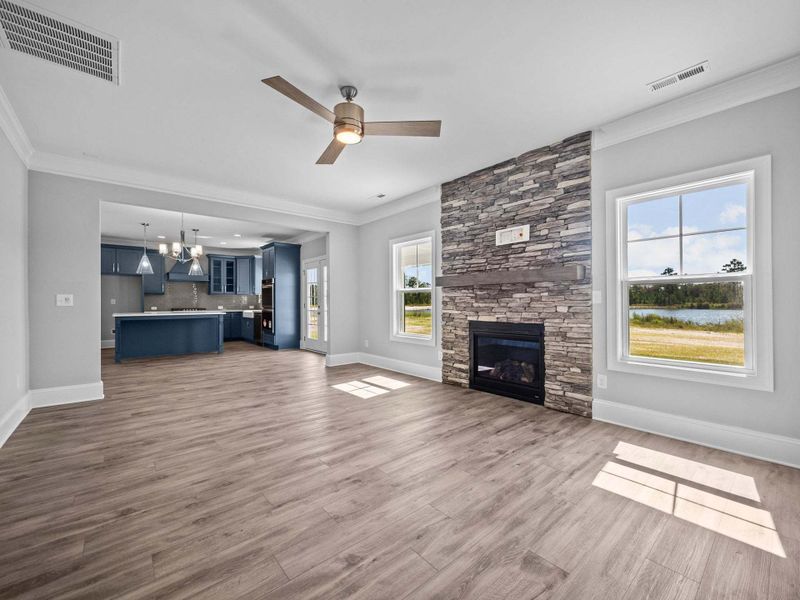 Great Room with Fireplace with Stone Surround Option Great Room with Fireplace with Stone Surround Option