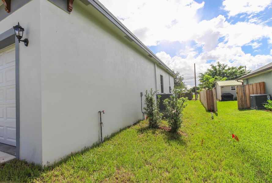 Exterior details and patio area of a home in , Port St. Lucie (Image 32).