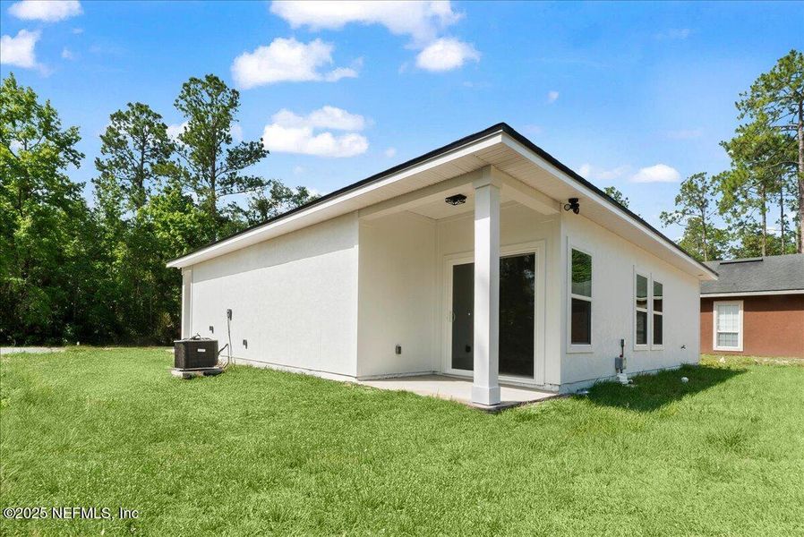 Exterior details and patio area of a home in , East Palatka (Image 16). Exterior details and patio area of a home in , East Palatka (Image 16).