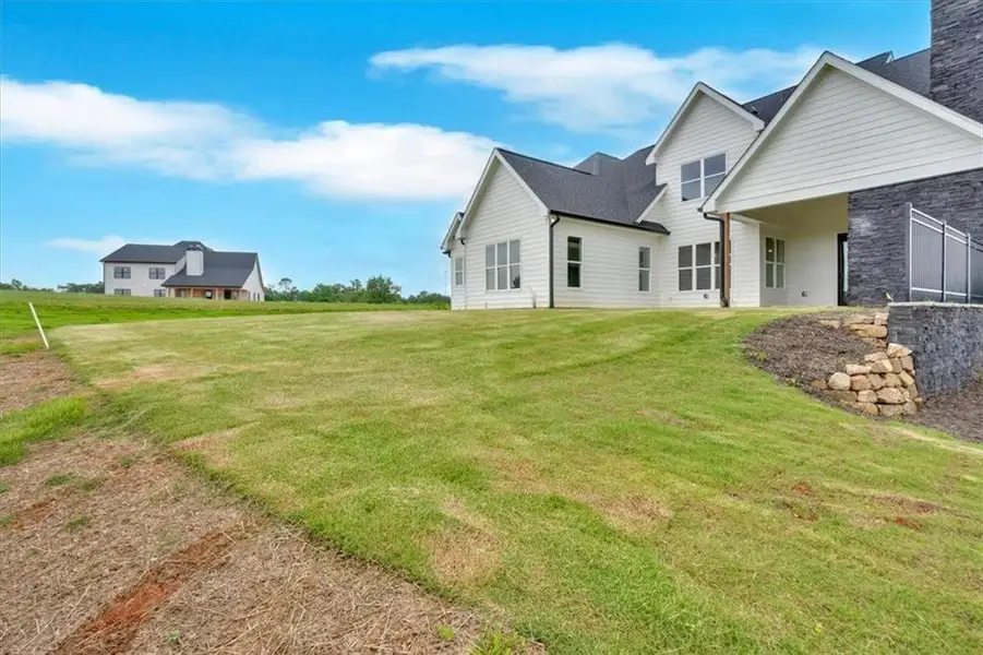 Exterior details and patio area of a home in , Rydal (Image 3). Exterior details and patio area of a home in , Rydal (Image 3).