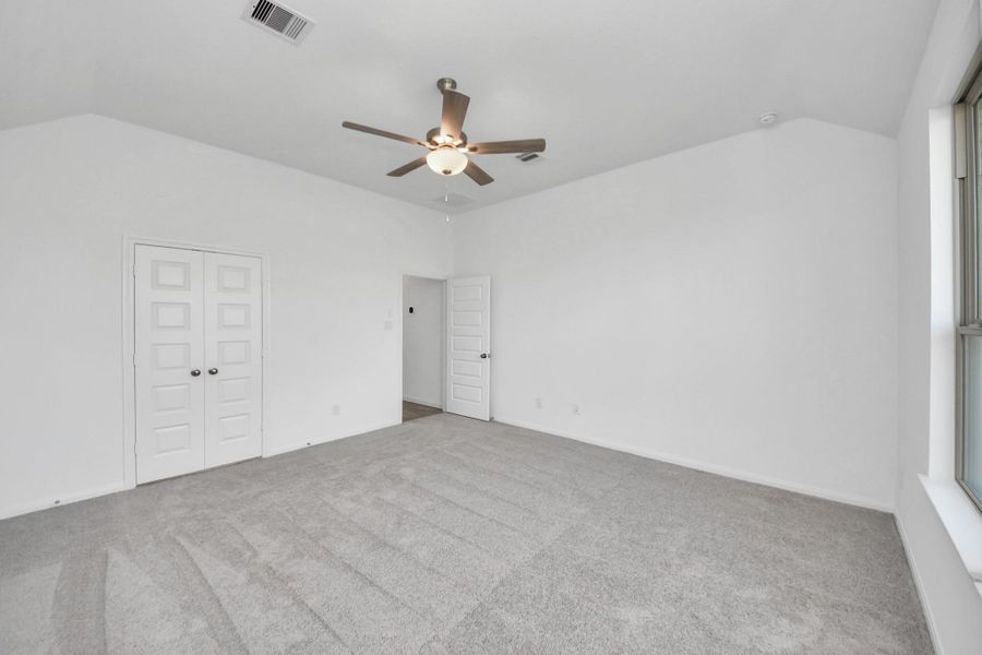 Spacious, unfurnished interior of a new home in 50' Traditional Homes at Elyson, Katy (Image 10).