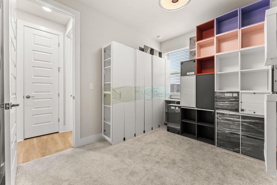 The second bedroom is located on the first floor and has a full bath adjacent.