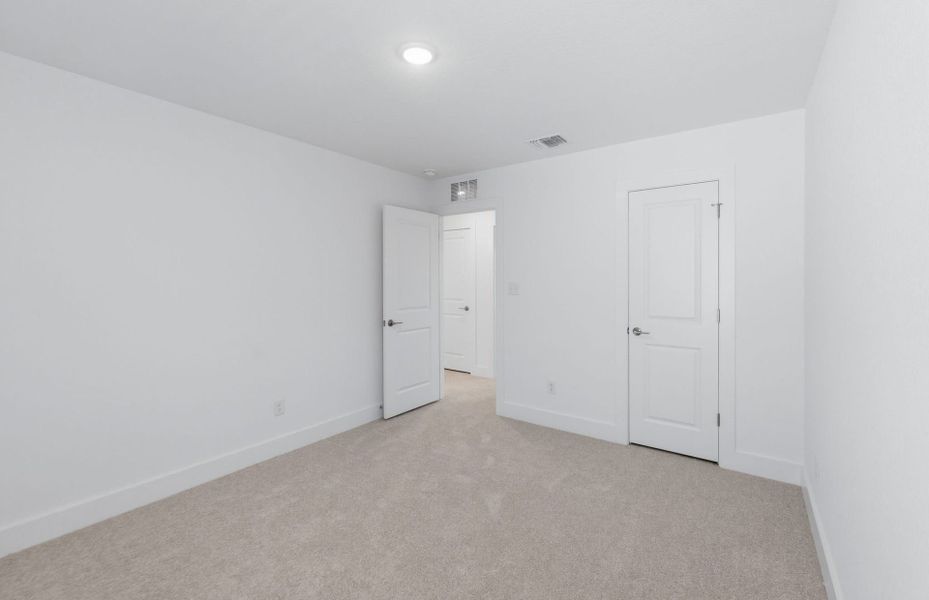 Spacious, unfurnished interior of a new home in Saddleback at Santa Rita Ranch, Liberty Hill (Image 46).
