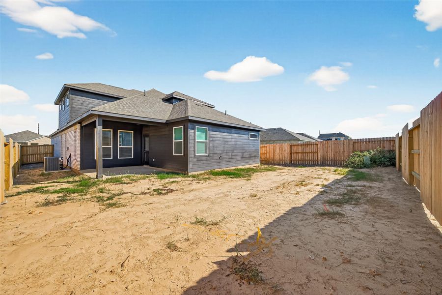 Exterior details and patio area of a home in Sunterra, Katy (Image 21). Exterior details and patio area of a home in Sunterra, Katy (Image 21).