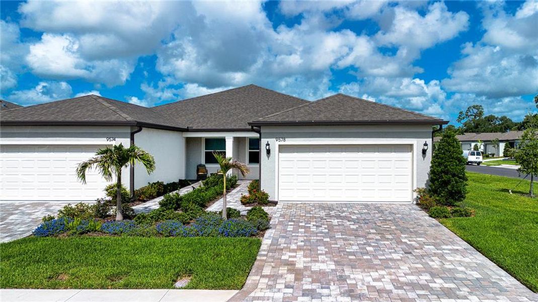Front exterior of a new home in , Parrish, FL, highlighting curb appeal (Image 21). Front exterior of a new home in , Parrish, FL, highlighting curb appeal (Image 21).