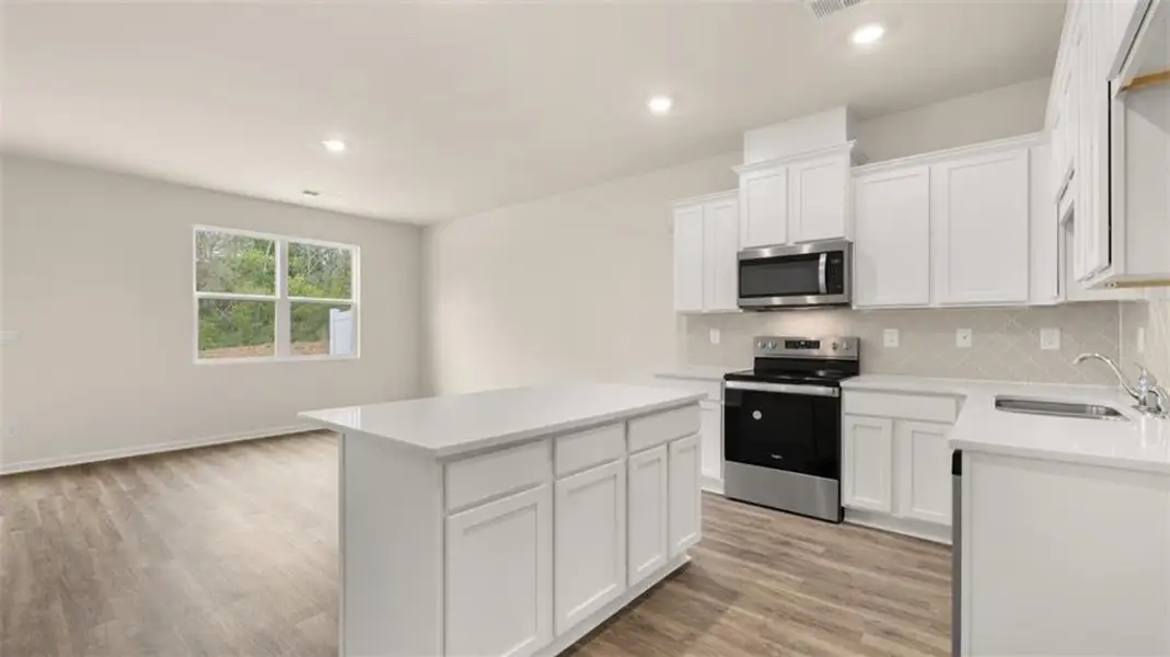 Furnished interior view inside a new home in Young's Crossing, Stone Mountain (Image 3).