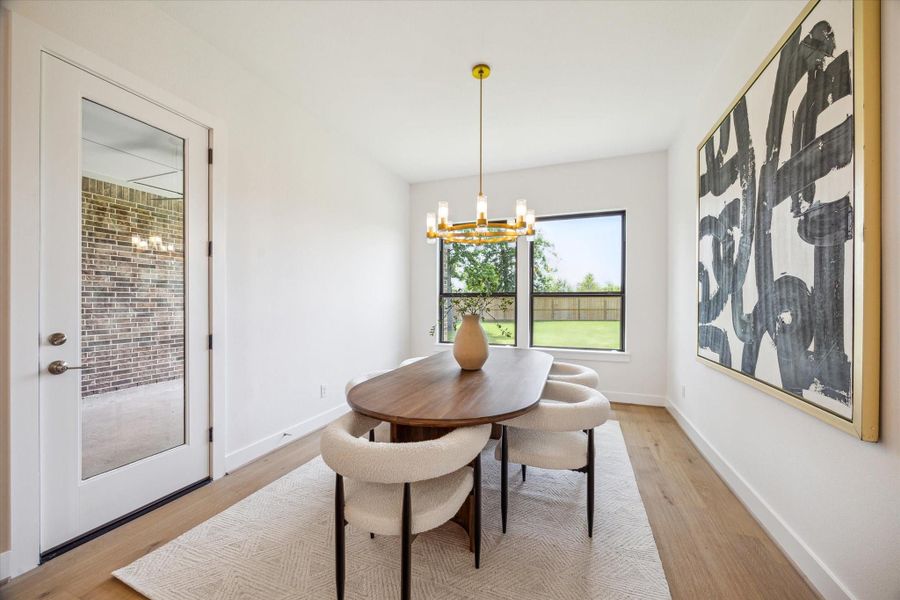Dining Area off the Kitchen. Direct access to the Back Porch. Dining Area off the Kitchen. Direct access to the Back Porch.