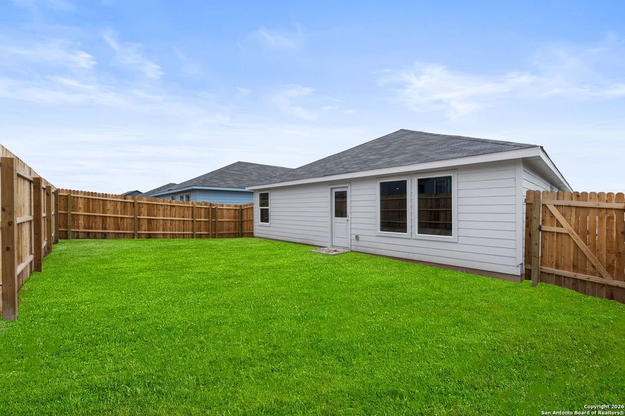 Exterior details and patio area of a home in Voss Farms, New Braunfels (Image 2).